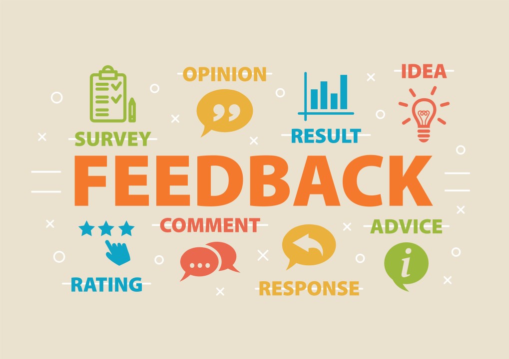  A conceptual illustration of the concept of feedback, using related words and icons such as survey, opinion, rating, comment, response, result, advice, and idea.
