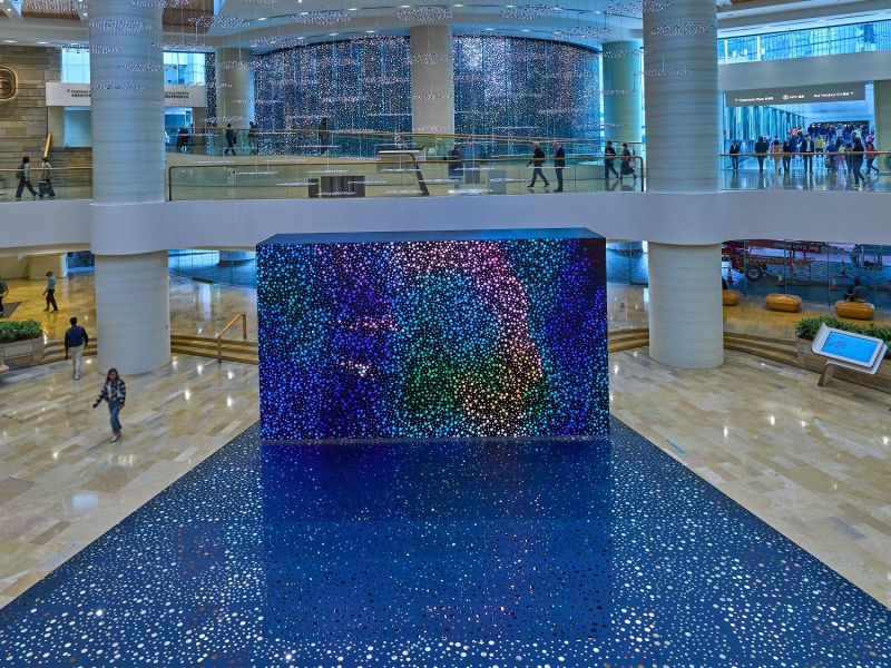 A captivating sensory experience! The #PacificPlace shopping centre is hosting a show by renowned First Nations Australian artist Daniel Boyd (Mar 21 - Apr 7), on the side-lines of the 2024 edition of #ArtBasel Hong Kong. It explores identity, memory, perception and history through the moving image, mirrored floor and window treatments, offering visitors unexpected encounters.   https://bit.ly/3HOs5pm  Photo credit: Pacific Place   #hongkong #brandhongkong #asiasworldcity #megaevents #megaHK #artsandculture #ArtBasel Swire Properties