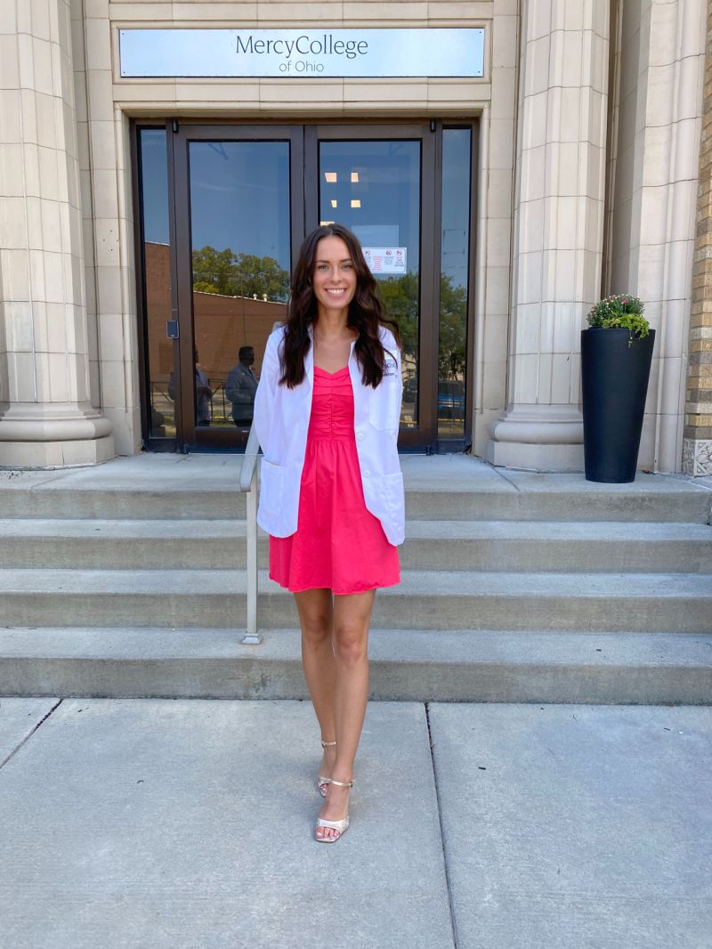 white coat ceremony dress it blends softness and elegance effortlessly. UNMC students don white coats